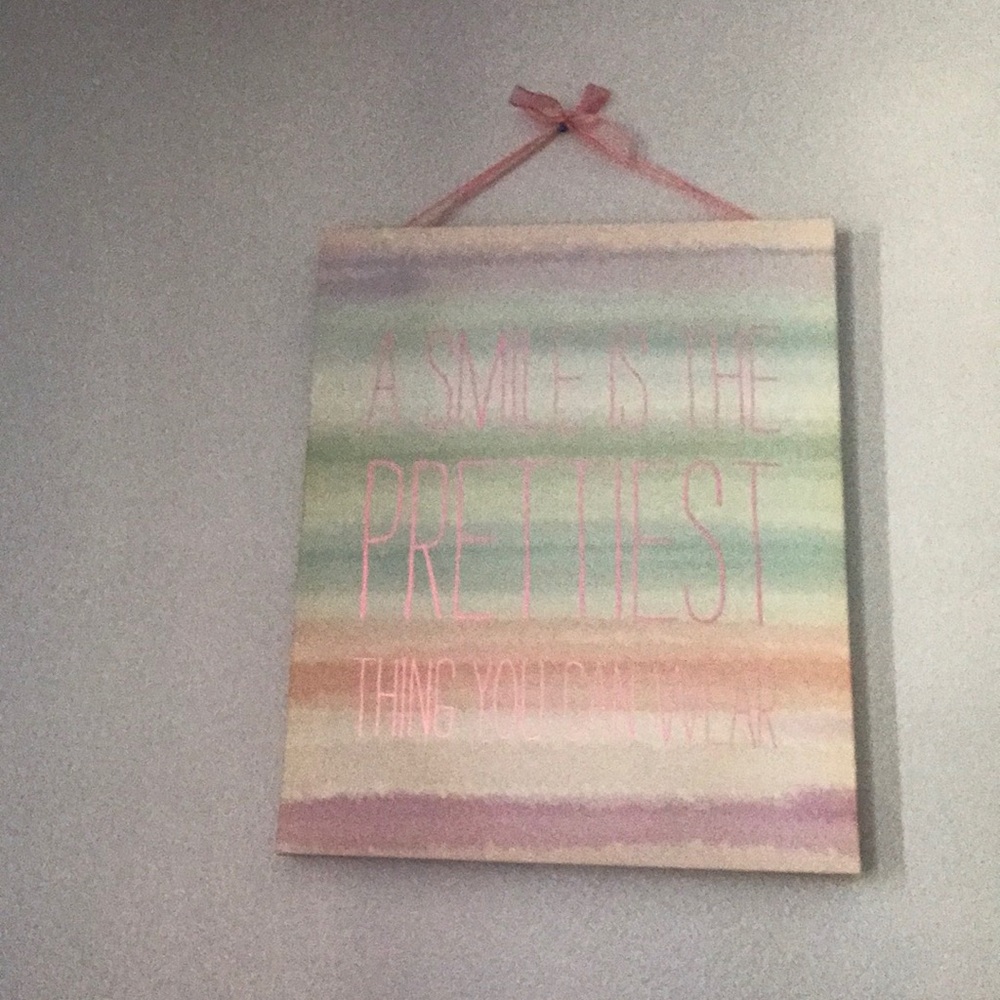 “A smile is the prettiest thing you can wear”